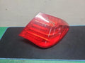 Right rear tail light assembly compatible with BMW 740 2009, genuine OEM replacement part 7182198