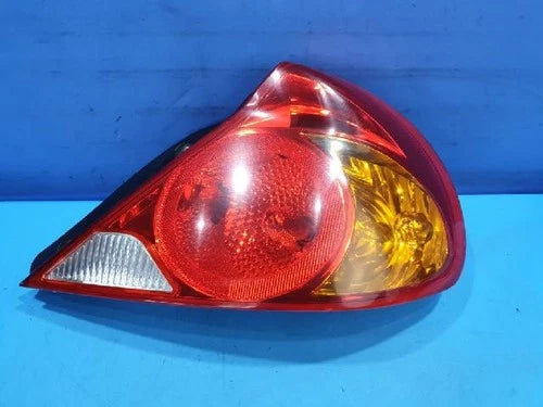 Right rear combination tail light assembly compatible with Kia Spectra 2003, genuine OEM replacement part 0K2N1 51150A
