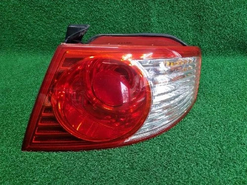 Right rear combination tail light assembly compatible with Kia Amanti 2005, genuine OEM replacement part 92402 3F070