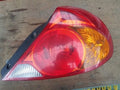 Right rear combination tail light assembly compatible with Kia Spectra 2003, genuine OEM replacement part 0K2N151150A