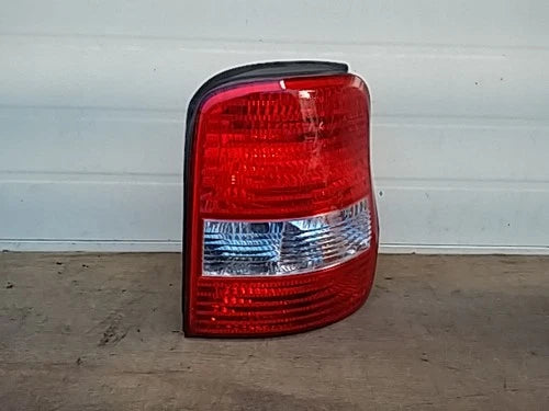 Used OEM Part - Combination Tail Light Assembly compatible with Kia Carnival 2002, genuine OEM replacement part 0K53A51150
