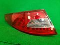 Left rear tail light assembly compatible with Kia K5 2011, genuine OEM replacement part 92401 2T100