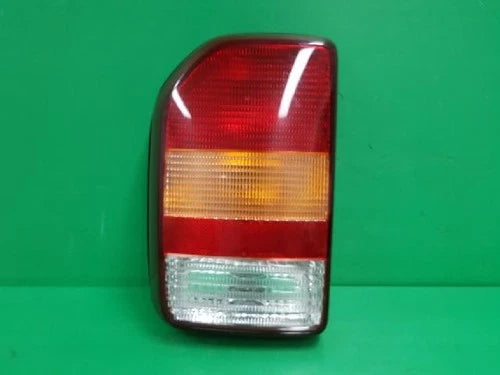 Left rear combination tail light assembly compatible with Kia Carnival 2001, genuine OEM replacement part 0K0UA 51160