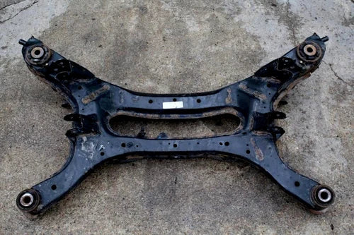 Refacción OEM Usada - 2010-2014 Nissan Maxima Travesaño de suspensión trasera Subchasis Soporte del motor OEM