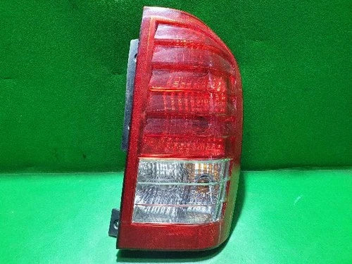 Used OEM Part - Combination Tail Light Assembly compatible with Kia Carnival 2010, genuine OEM replacement part 92402 4J000