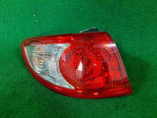 Left outer rear tail light assembly (combination) compatible with Hyundai Santa Fe 2010, genuine OEM replacement part 92401 2B500