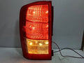 Used OEM Part - Combination Tail Light Assembly compatible with Kia Carnival 2010, genuine OEM replacement part 924014J000