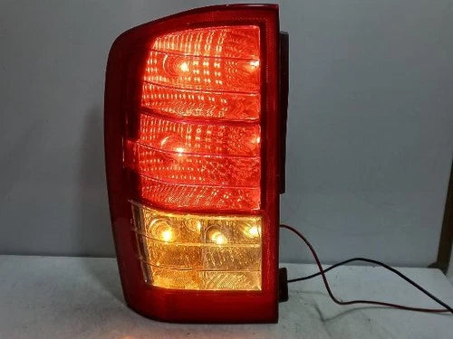 Used OEM Part - Combination Tail Light Assembly compatible with Kia Carnival 2010, genuine OEM replacement part 924014J000