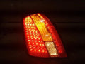 Left rear combination tail light assembly compatible with Kia Amanti 2009, genuine OEM replacement part 92401-3F500
