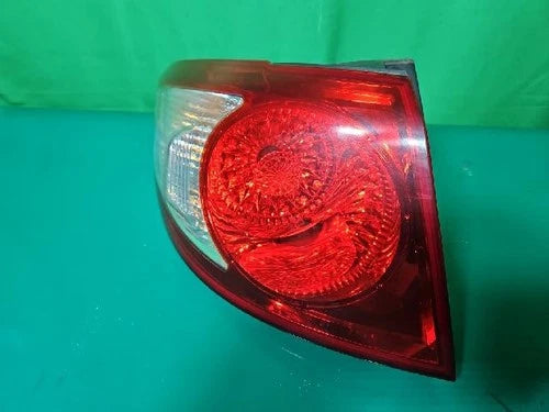 Left outer rear tail light assembly (combination) compatible with Hyundai Santa Fe 2008, genuine OEM replacement part 92401 2B000