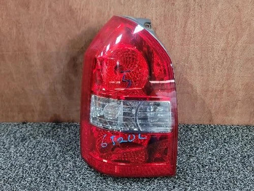 Left rear combination tail light assembly compatible with Hyundai Tucson 2008, genuine OEM replacement part 92401 2E100