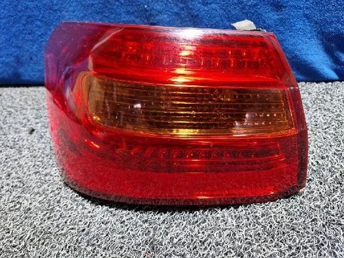 Left outer rear tail light assembly compatible with Kia Cadenza 2010, genuine OEM replacement part 92401 3R000