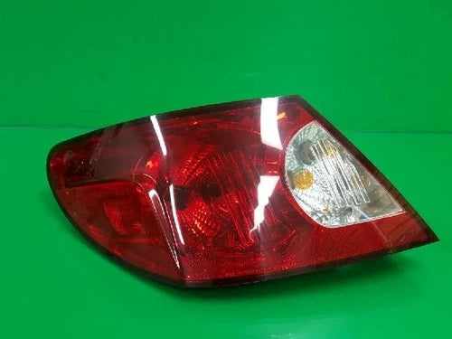 Left rear tail light assembly compatible with Chrysler Sebring 2007, genuine OEM replacement part 05303987AD