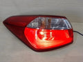 Used OEM Part - Combination Tail Light Assembly compatible with Kia Forte 2014, genuine OEM replacement part 92401A7000