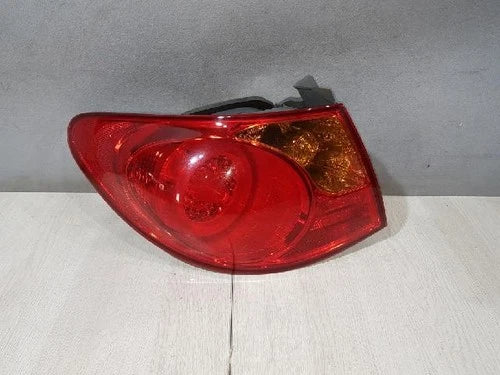 Left outer rear tail light assembly compatible with Hyundai Elantra 2010, genuine OEM replacement part 924012H500