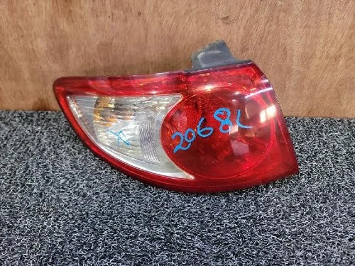Left rear combination tail light assembly compatible with Hyundai Santa Fe 2006, genuine OEM replacement part 92401 2B000