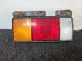 Left rear combination tail light assembly compatible with Hyundai Mighty 2008, genuine OEM replacement part 92401 7A100