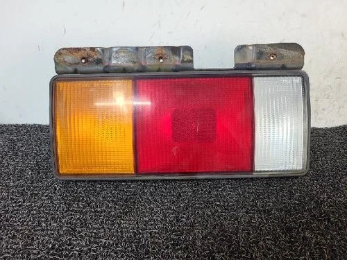 Left rear combination tail light assembly compatible with Hyundai Mighty 2008, genuine OEM replacement part 92401 7A100