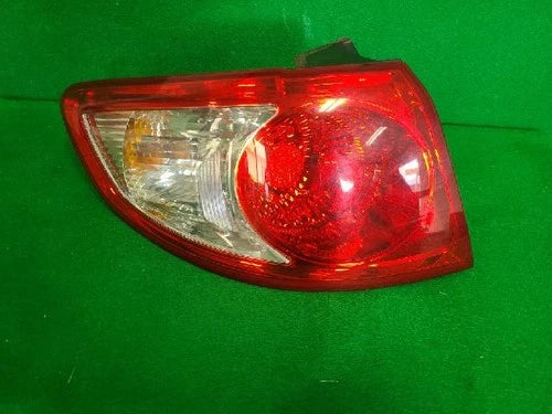 Used OEM Part - Tail light assembly compatible with Hyundai Santa Fe 2006, genuine OEM replacement part 92401-2B00