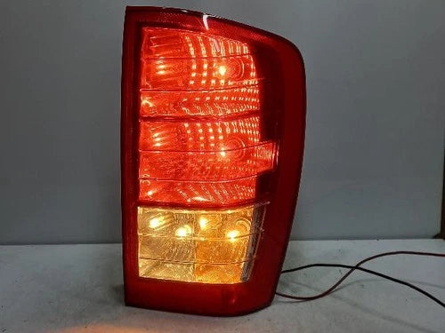 Used OEM Part - Combination Tail Light Assembly compatible with Kia Carnival 2010, genuine OEM replacement part 924024J000