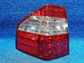Left rear combination tail light assembly compatible with Kia Borrego 2008, genuine OEM replacement part 92401 2J100
