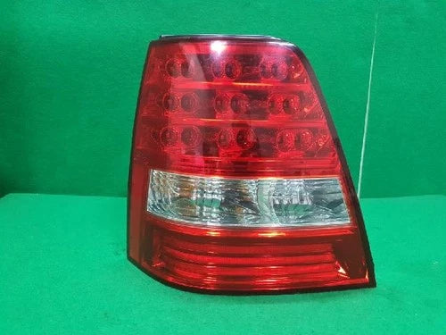 Left rear tail light assembly compatible with Kia Sorento 2006, genuine OEM replacement part 92401 3E500