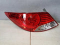 Left rear combination tail light assembly compatible with Hyundai Accent 2011, genuine OEM replacement part 924011R000