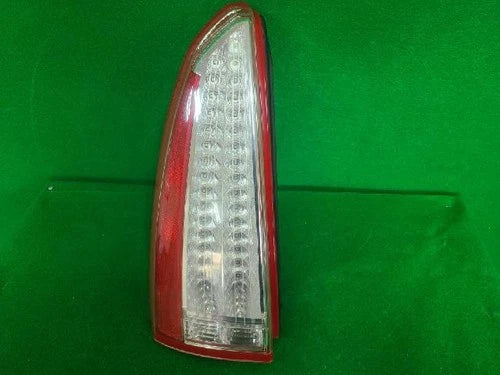 Left rear tail light assembly (OEM) compatible with Cadillac BLS 2006, part number 15777299