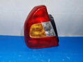Left rear tail light assembly compatible with Hyundai Accent 1999, genuine OEM replacement part 92401 25000