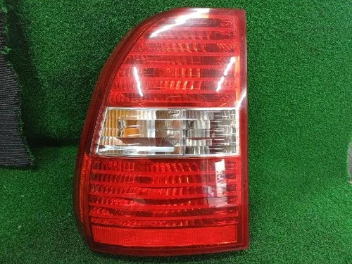 Left rear tail light assembly compatible with Kia Sportage 2006, genuine OEM replacement part 92401 1F002