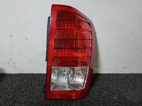 Used OEM Part - Combination Tail Light Assembly compatible with Kia Carnival 2010, genuine OEM replacement part 92402 4J000