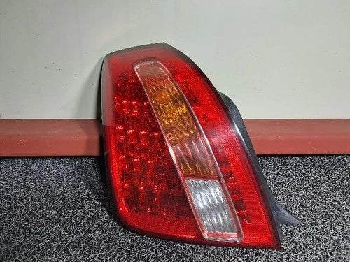 Left rear combination tail light assembly compatible with Kia Amanti 2009, genuine OEM replacement part 92401 3F500