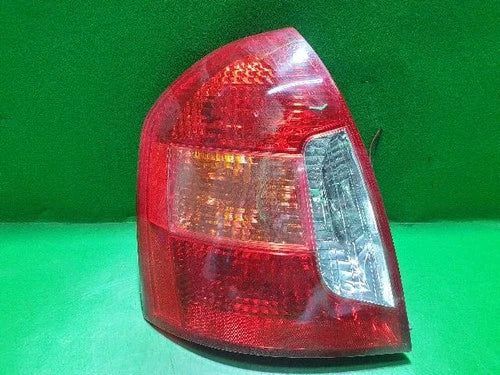 Left rear combination tail light assembly compatible with Hyundai Accent 2009, genuine OEM replacement part 92401 1E000