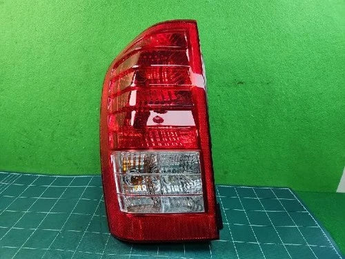 Left rear combination tail light assembly compatible with Kia Carnival 2011, genuine OEM replacement part 92401 4J000