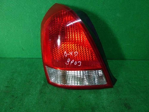 Left rear tail light assembly compatible with Hyundai Elantra 2001, genuine OEM replacement part 92401 2D000