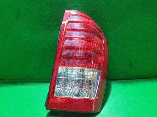 Used OEM Part - Combination Tail Light Assembly compatible with Kia Carnival 2010, genuine OEM replacement part 92402 4J000