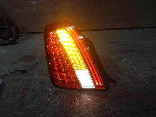 Left rear combination tail light assembly compatible with Kia Amanti 2010, genuine OEM replacement part 92401-3F800