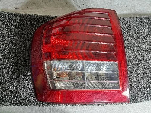 Rear combination tail light (left/driver side) for Kia Carnival 2013, genuine OEM replacement part 9244J0
