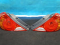 Right rear combination tail light assembly compatible with Kia Spectra 2002, genuine OEM replacement part 0K2N151150A