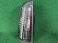 Rear tail light assembly (driver side) for Cadillac STS Sedan 2009, genuine OEM replacement part 25754023