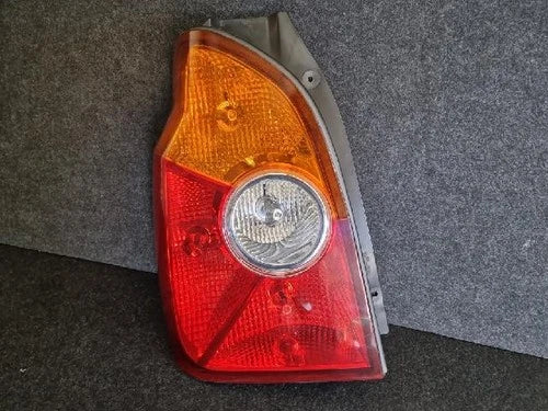 Left rear combination tail light assembly compatible with Hyundai Terracan 2002, genuine OEM replacement part 92401 H1010