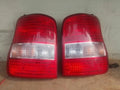 Right rear tail light assembly compatible with Kia Carnival 2002, genuine OEM replacement part 0K53A51150