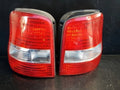Right rear tail light assembly compatible with Kia Sedona 2002, genuine OEM replacement part 0K53A51150