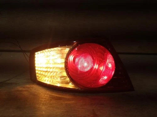 Left rear combination tail light assembly compatible with Kia Amanti 2006, genuine OEM replacement part 92401-3F000