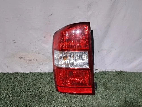 Left rear tail light assembly compatible with Kia Sedona 2011, genuine OEM replacement part 92401 4J000