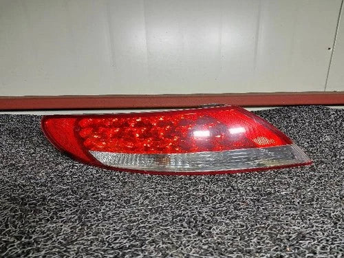 Left rear combination tail light assembly compatible with Hyundai Azera 2006, genuine OEM replacement part 92401 3L001