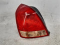 Left rear tail light assembly compatible with Hyundai Elantra 2002, genuine OEM replacement part 92401 2D300