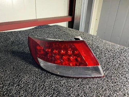 Left rear combination tail light assembly compatible with Hyundai Azera 2006, genuine OEM replacement part 92401 3L001