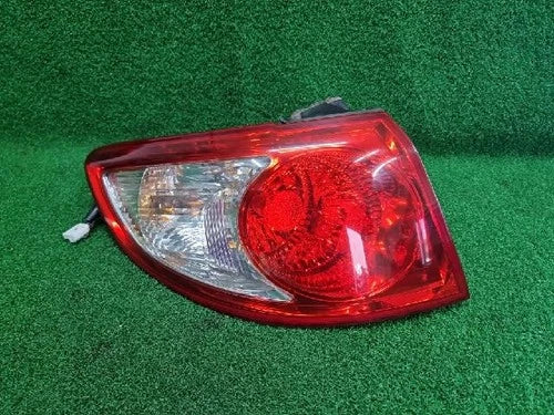 Left rear combination tail light assembly compatible with Hyundai Santa Fe 2007, genuine OEM replacement part 92401 2B000