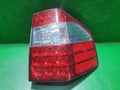 Used OEM Part - Combination Tail Light Assembly compatible with Kia Borrego 2008, genuine OEM replacement part 92402 2J000